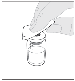 Torka av injektionsflaskans ovandel med en av spritkompresserna (F) som ingår i förpackningen och låt lufttorka. Vidrör inte injektionsflaskans ovandel och låt ingenting annat nudda den efter att den har torkats av.