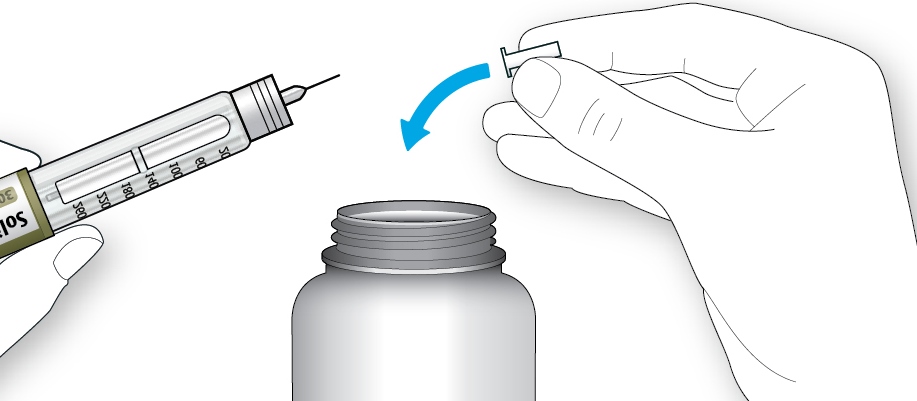 Bilden visar hur du drar av det inre nålskyddet