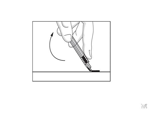 Bilden beskriver hur nålen pressas fast i säkerhetsanordningen.