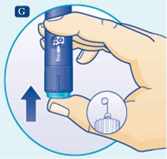 Tryck in doseringsknappen tills siffran 0 i dosfönstret är i linje med markören 
