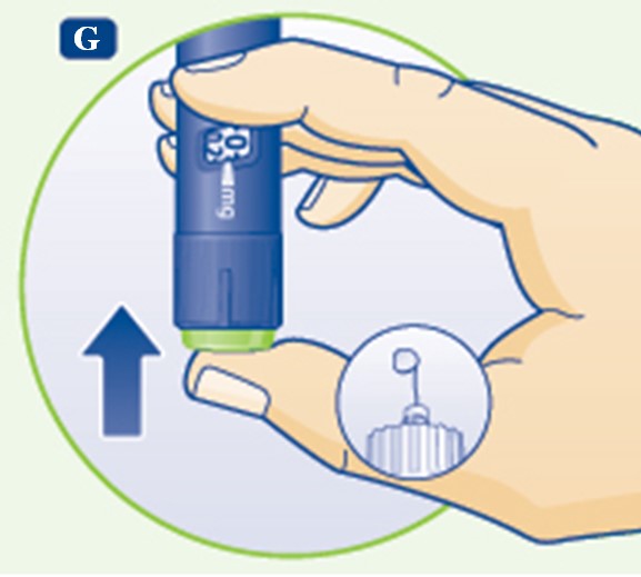 Tryck in doseringsknappen tills siffran 0 i dosfönstret är i linje med markören 