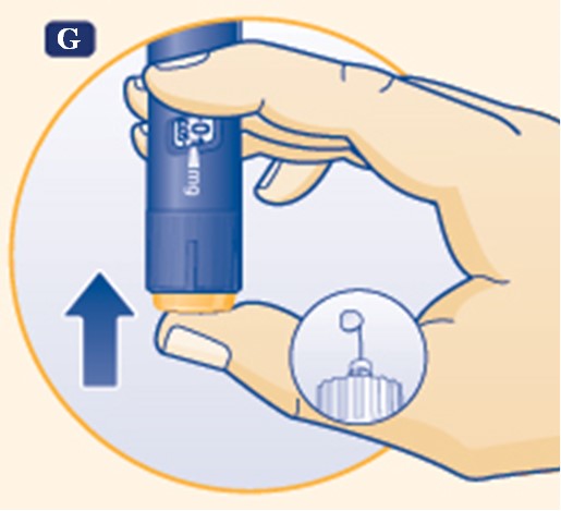 Tryck in doseringsknappen tills siffran 0 i dosfönstret är i linje med markören 
