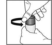 Bilden visar hur locket på patronen avlägsnas.